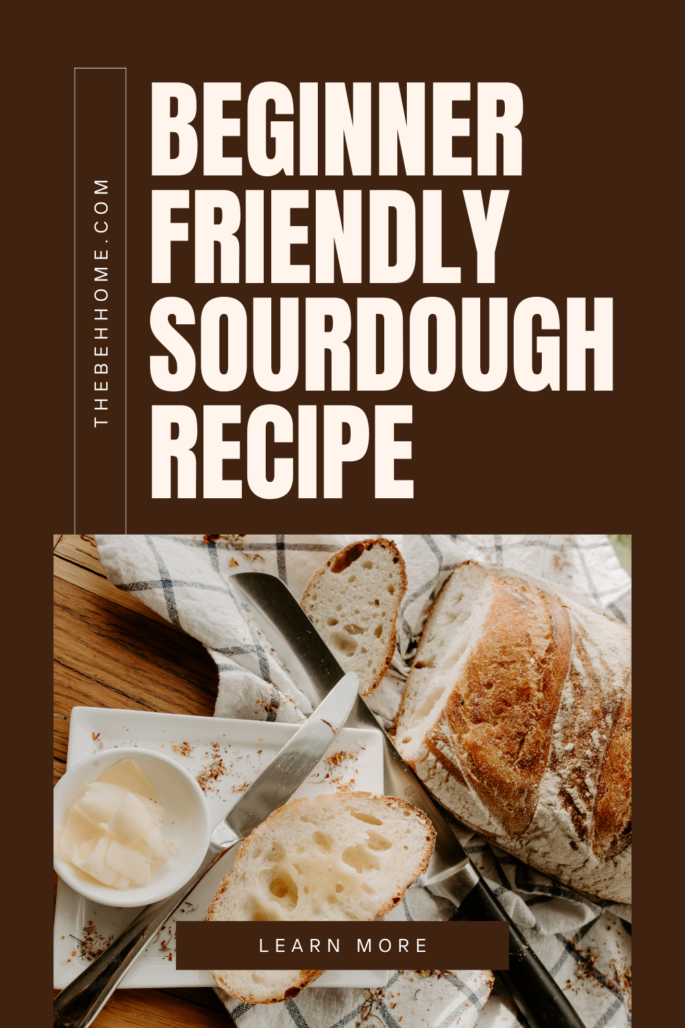 fresh baked fluffly light tan sourdough bread sliced next to golden butter ready to serve